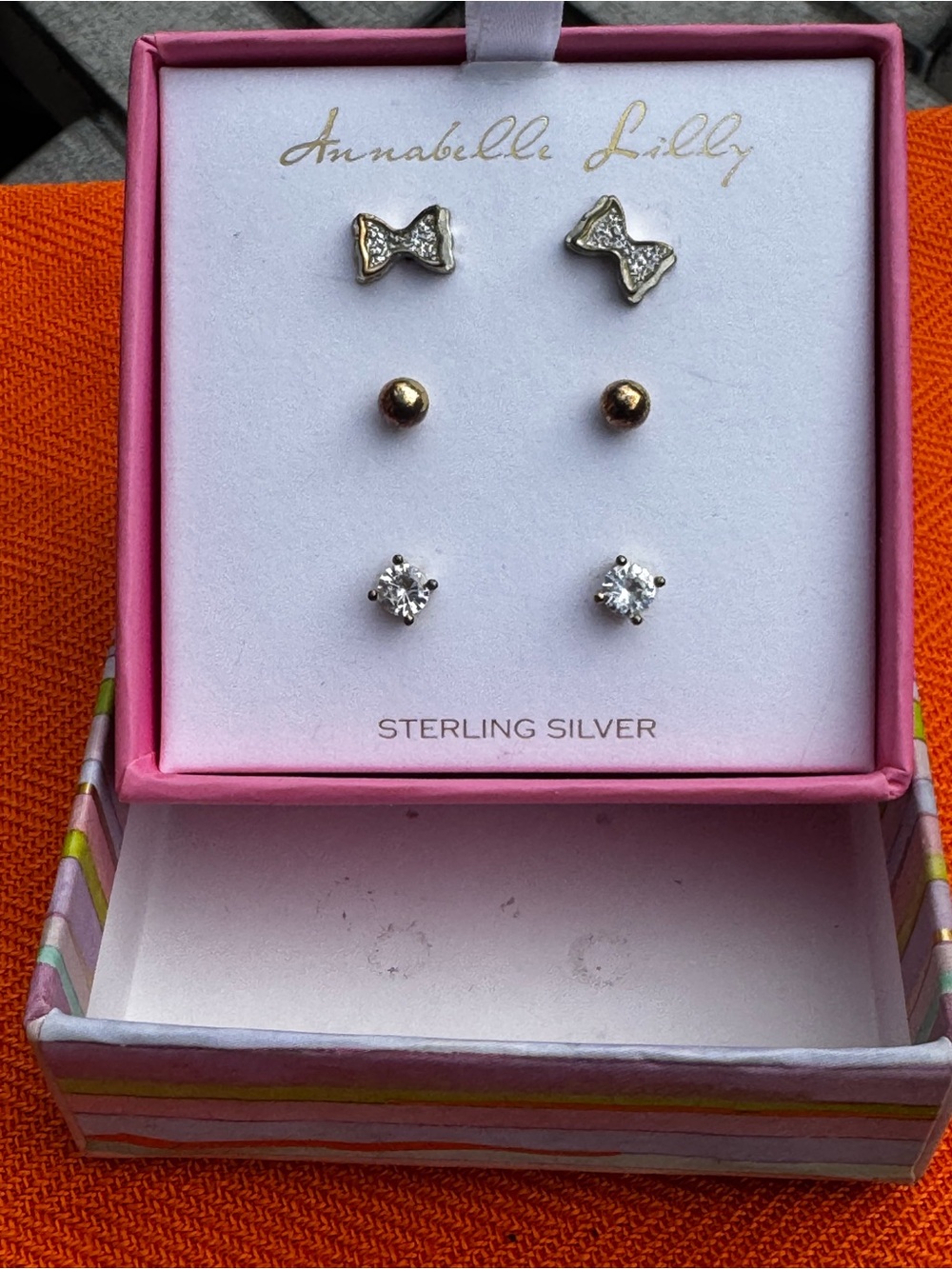 Sterling silver pierced earrings.